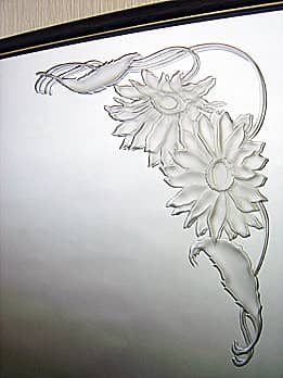ガザニアの花を彫刻した鏡