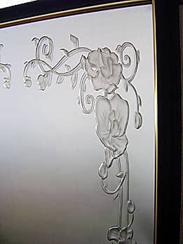 サンドブラストで蘭の花を彫刻した鏡
