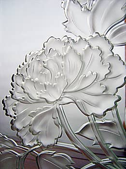 牡丹の花を彫刻した鏡