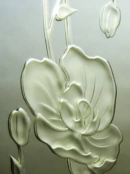 鏡に彫刻した蘭の花のクローズアップ画像