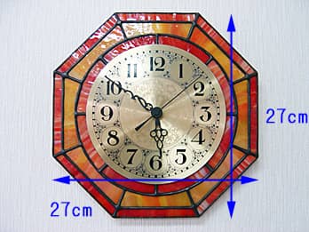 時計の針を取り付ける軸を中心にして、八角形のステンドグラス部を少しだけ回して固定した場合のステンドグラス時計 オレンジ（八角形）の縦横のサイズ画像